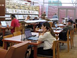student in library